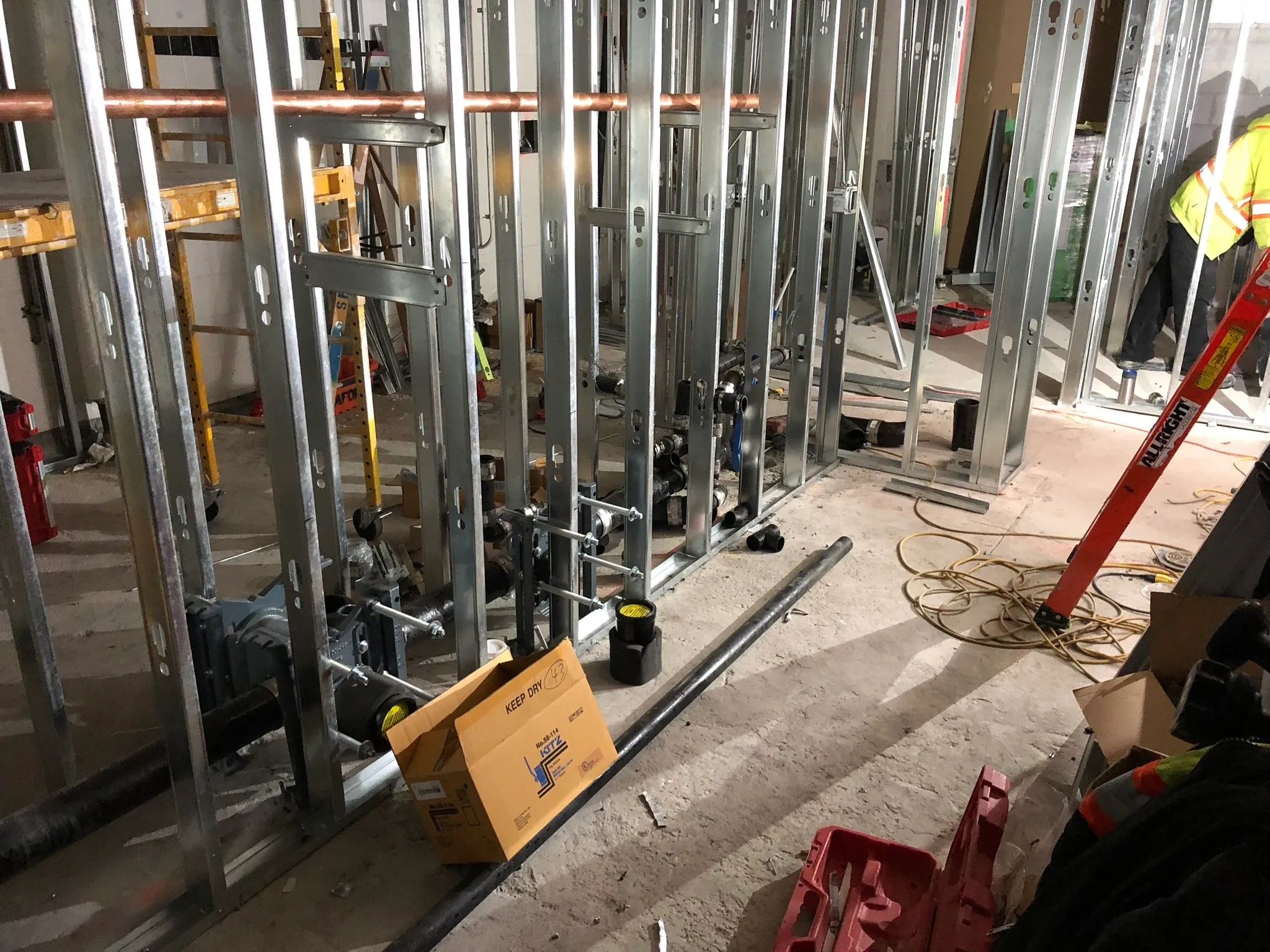 Plumbing installation inside metal wall framing
