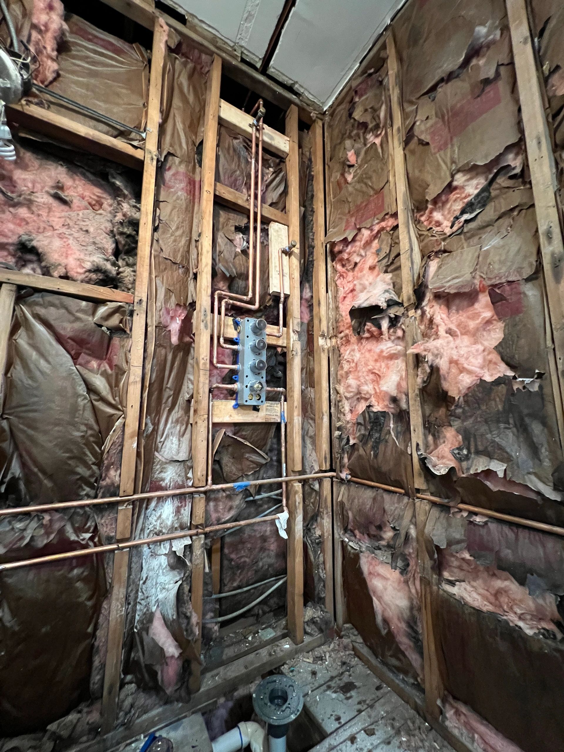 Exposed plumbing rough-in during renovation